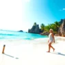 stunning tropical beach with white sand and turquoise water under blue sky